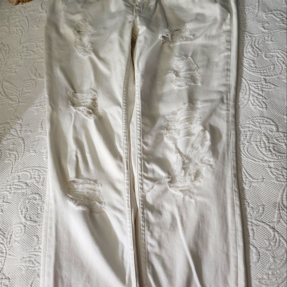 Women's jeans tattered and great fit with lycra.  Love these .